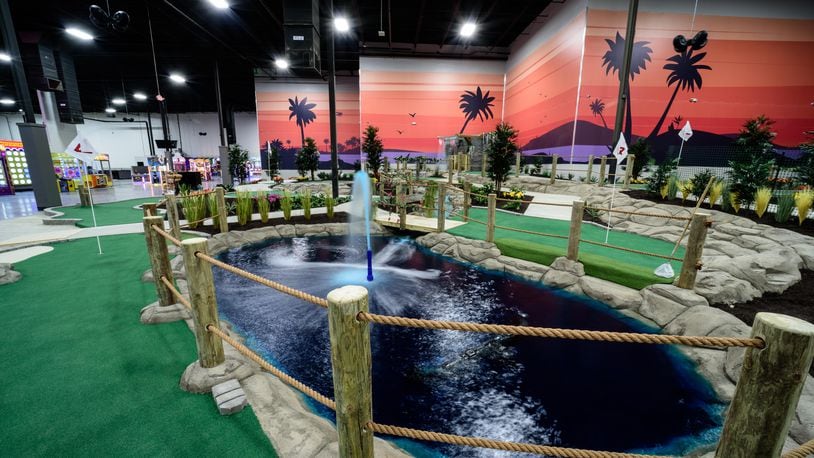 Here’s a sneak peek of Scene75 Entertainment Center's new Sunset Island mini-golf course. The indoor entertainment center is reopening today, December 16, 2020 after being closed for extensive renovations and repairs due to heavy damage from the 2019 Memorial Day tornadoes. TOM GILLIAM / CONTRIBUTING PHOTOGRAPHER
