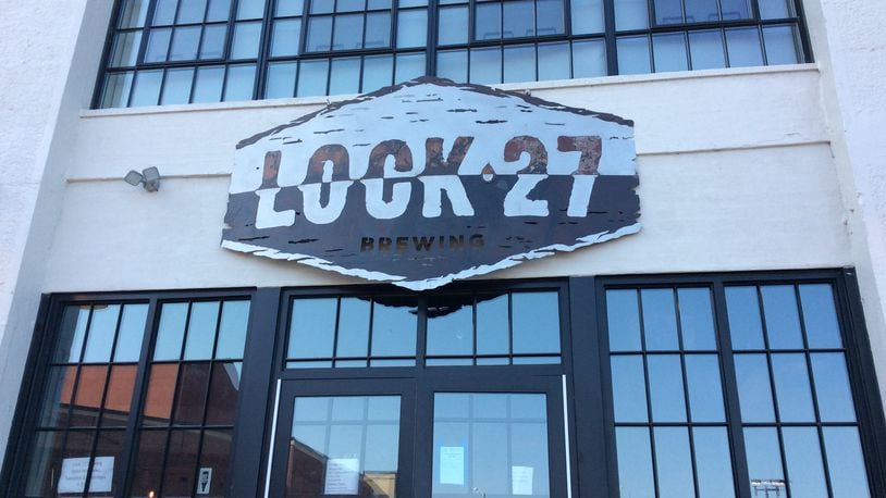 Lock 27 Brewing in downtown Dayton asked its customers for feedback on the parking options. MARK FISHER/STAFF