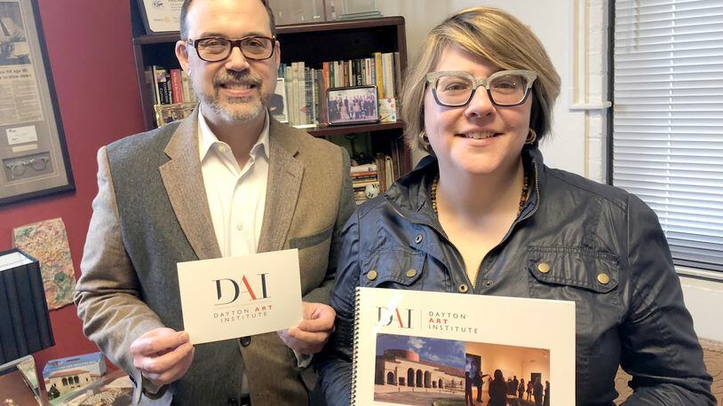 Dayton Art Institute CEO and President Michael Roediger and Alexis Larsen, its external affairs director, unveiled DAI’s new logo at the institution’s annual meeting Thursday, Feb. 28, 2019.