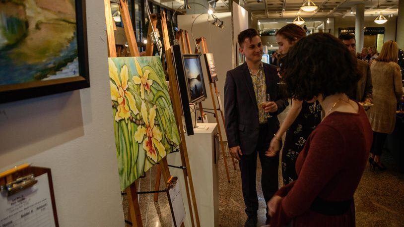 The Dayton Visual Art Center's signature fund-raiser, the 23rd Annual Art Auction, brought artists and patrons together on Friday, April 28, 2017, at Sinclair Community College's Ponitz Center. CONTRIBUTED PHOTOS BY TOM GILLIAM