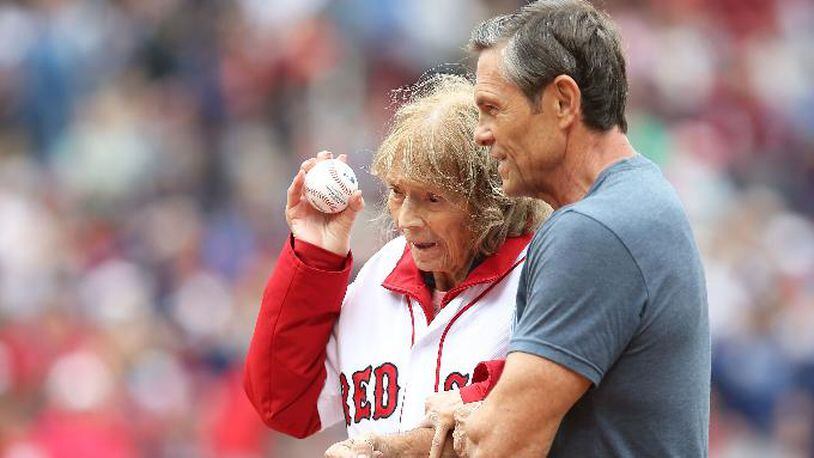 Julia Ruth Stevens, the daughter of Babe Ruth, throws out a ceremonial first pitch before a game between the Tampa Bay Rays and Boston Red Sox on July 9, 2016, at Fenway Park in Boston.