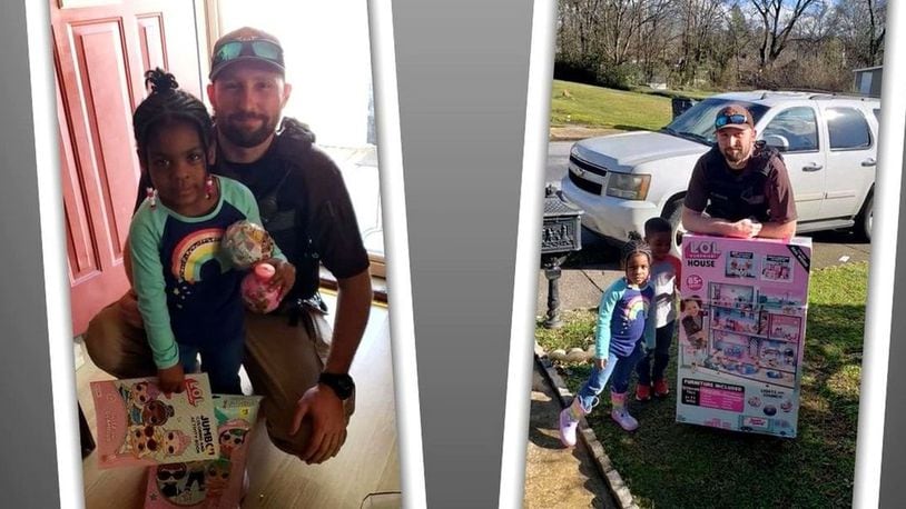 Polk County Sheriff’s Deputy Brandon Gilham surprised Jade, 4, with a dollhouse, after a thief stole her dolls in January. (WSBTV.com/WSBTV.com)
