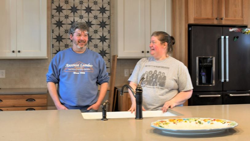 Jerry and Kristin Webster talk about the kitchen in their new home in an 1902 brick structure first built as a school and then used for decades for a meeting place of Old Order German Baptists. CONTRIBUTED