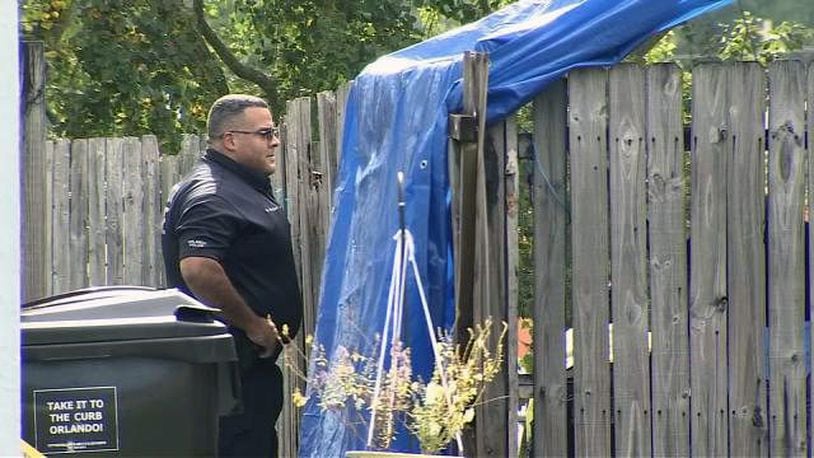 The body of a 44-year-old man was found at a home where a freshly dug hole was. (Photo: WFTV.com)