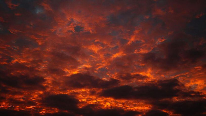 An unusual weather phenomenon caused the skies over Midland, Texas, to glow with a weird red light Tuesday night, similar to this shot of a sunset.
