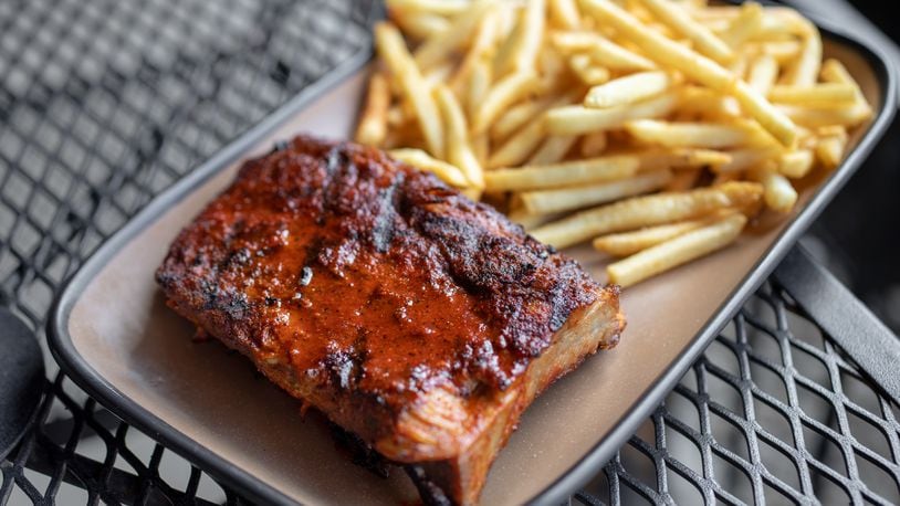 TJ Chumps, founded by Terry Brill and Jim Dunn in 2002, has become a go-to spot for lovers of ribs, salmon, burgers and beer over the past two decades. CONTRIBUTED