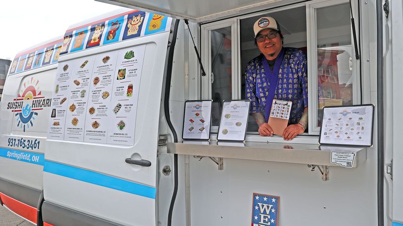 Kway Say, the owner of Sushi Hikari located in downtown Springfield's COhatch the Market, is opening a new food truck. BILL LACKEY/STAFF