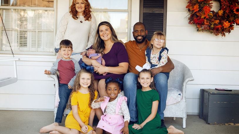 The Ivery family has adopted six children, including their youngest daughter, Hanaley. But Megan gave birth to Hanaley through embryo adoption. L-R Back Zoie; Middle: Braxton, Megan holding Hanaley, Shimar holding Makenzie Front: Lia, Janiyah and Sophia.