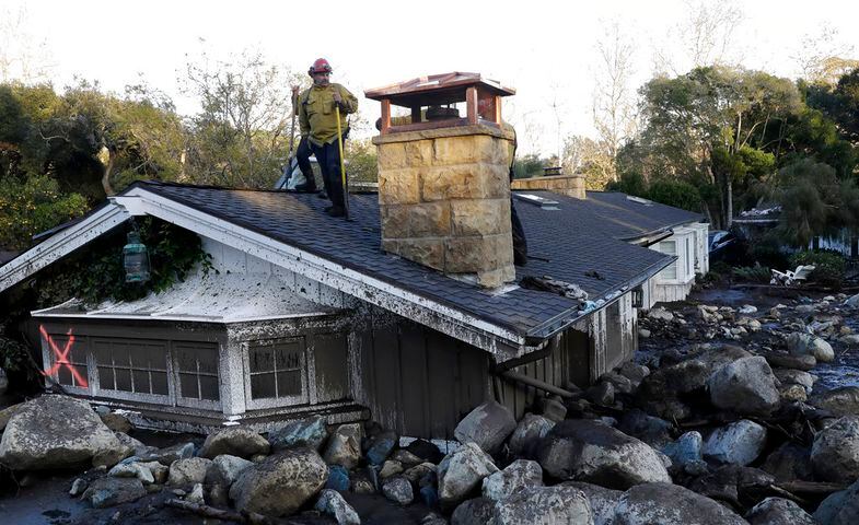 Photos: Mudslides bury California homes