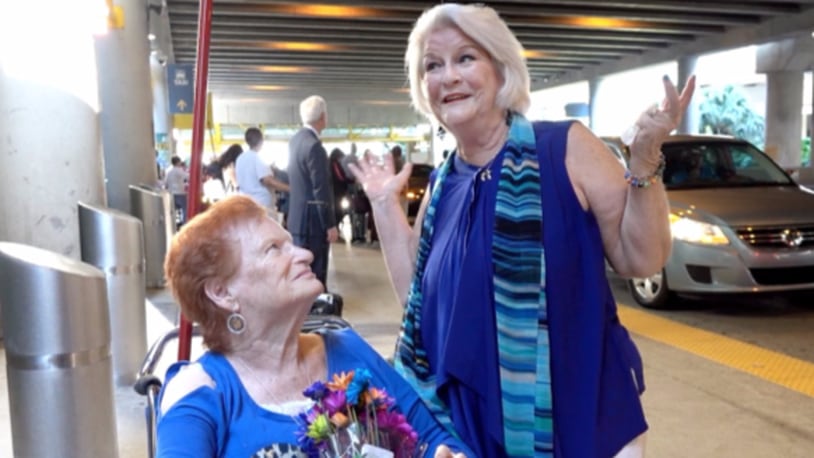 Toni Rosenberg, right, of Boca Raton, meets her sister Florence Serino for the first time at Fort Lauderdale-Hollywood International Airport in Fort Lauderdale Tuesday May 16, 2016. Serino had just traveled from her home in Irvine, California. (Photo: Meghan McCarthy / Palm Beach Post)