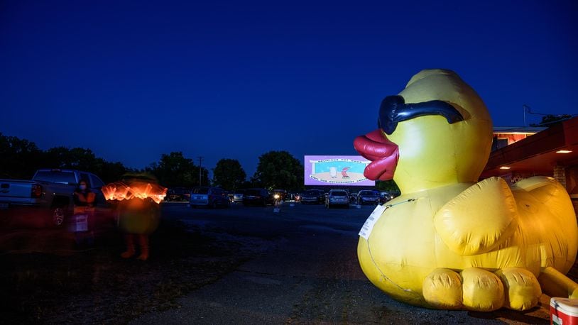 A socially distanced version of the 17th Annual URS Rubber Duck Regatta, a benefit for United Rehabilitation Services, was held on Friday, September 18, 2020, at the Dixie Twin Drive-In. RiverScape MetroPark, the event's regular venue, couldn't be used due to COVID-19 event restrictions. A virtual duck drop from a past regatta filmed by photographer Andy Snow was shown on the big screen. The movies "Back to the Future" and "How to Train Your Dragon" were shown simultaneously after the virtual duck drop. TOM GILLIAM/CONTRIBUTING PHOTOGRAPHER