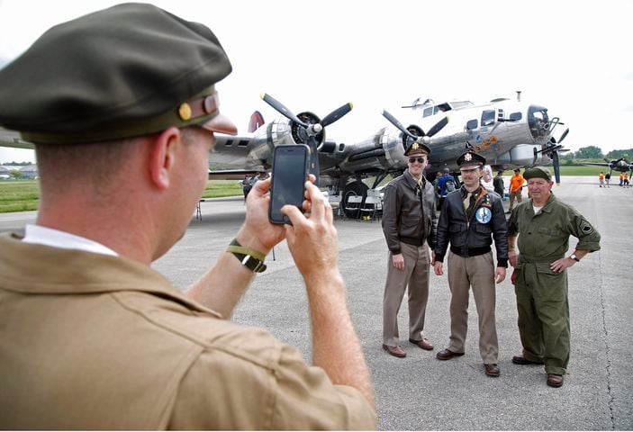 PHOTOS: Crowd welcomes the iconic Memphis Belle to its NEW exhibit at the Air Force Museum