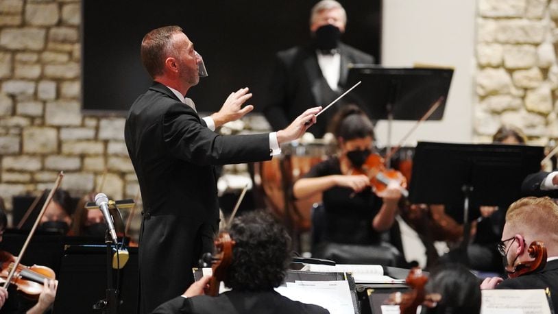 Scott Woodard conducts the Butler Philharmonic in an October 2021 concert at First Baptist Church in Hamilton. FILE