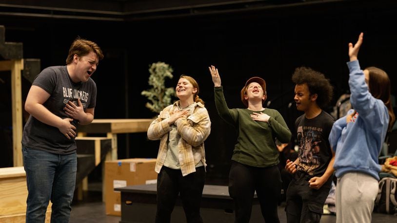 Left to right: Henry Reisbeck leading "All Good Gifts" with Megan Carlson, Anna Delaney, Darian Watson, and Kaitlyn Crowell in University of Dayton's production of "Godspell." PHOTO BY SYLVIA STAHL
