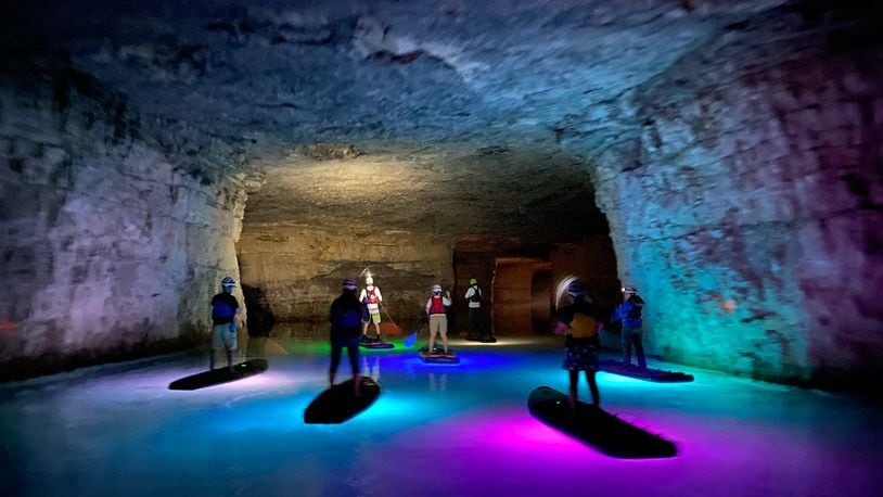 Guests can embark upon a stand up paddleboard tour at the Gorge Underground in Rogers, Kentucky.