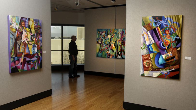 âStories,â the work of four regional painters, Cedric Cox, Jean Koeller, Morris Howard and Ann Kim, is on display in the Burnell R. Roberts Triangle Gallery at Sinclair Community College. LISA POWELL / STAFF