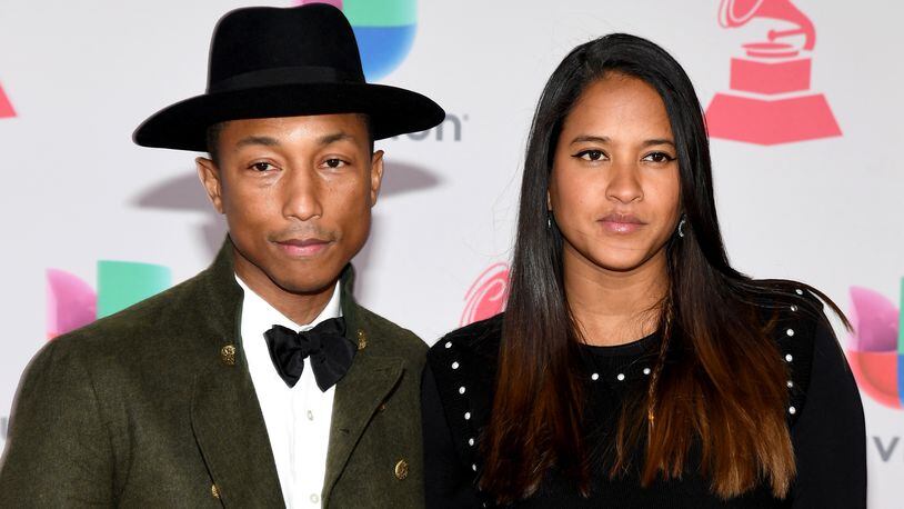 LAS VEGAS, NV - NOVEMBER 17: Pharrell Williams (L) and Helen Lasichanh attend The 17th Annual Latin Grammy Awards at T-Mobile Arena on November 17, 2016 in Las Vegas, Nevada. (Photo by Ethan Miller/Getty Images )
