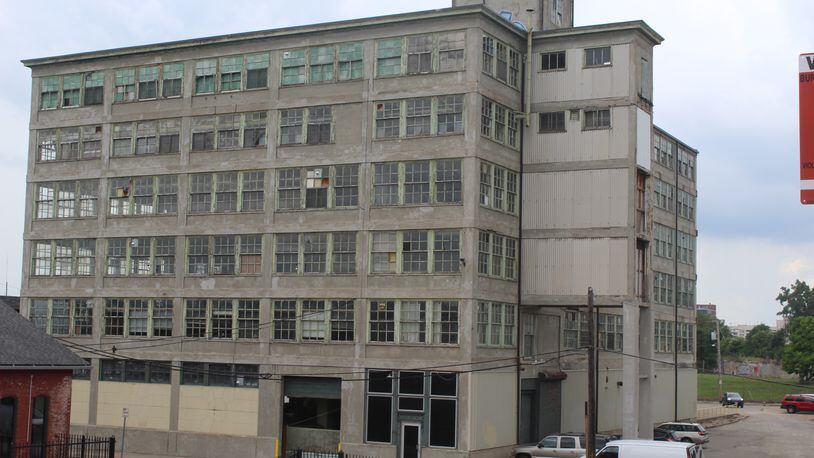 Developer Weyland Ventures plans to spend about $18 million converting the Dayton Motor Car building into new offices. CORNELIUS FROLIK / STAFF