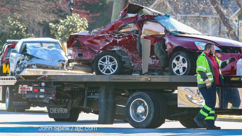 A deadly crash on Lawrenceville Highway caused delays near Jimmy Carter Boulevard. JOHN SPINK / JSPINK@AJC.COM