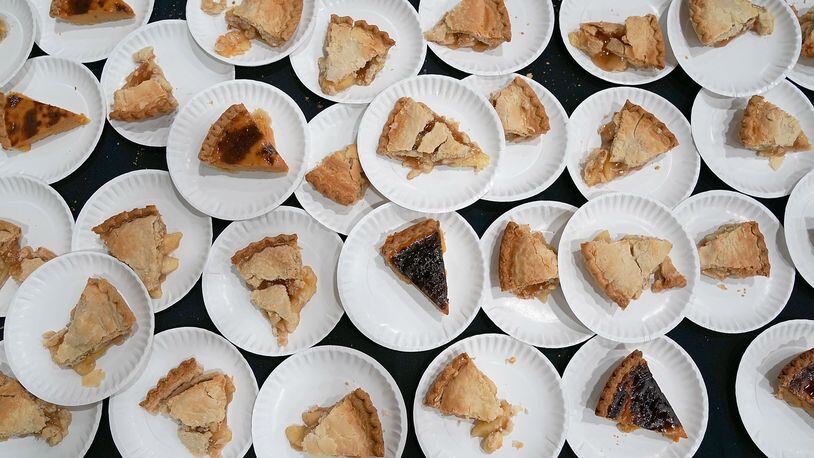 Slices of pie are ready to be served during The Salvation Army and Safeway's 18th annual "Feast of Sharing," at the Walter E. Washington Convention Center November 22, 2017 in Washington, DC. January 23 is known as National Pie Day and is being celebrated in 2019 with free and discounted pie.