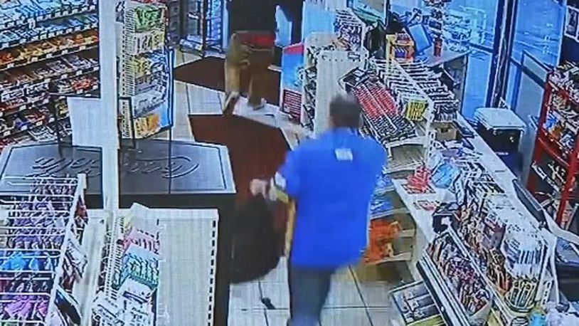 Clerk's fight with armed shoplifter caught on camera