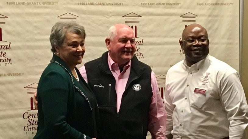 U.S. Secretary of Agriculture Sonny Perdue speaks at Central State University on Thursday. Perdue (center) met with students, President Cynthia Jackson-Hammond (left) and other school leaders.