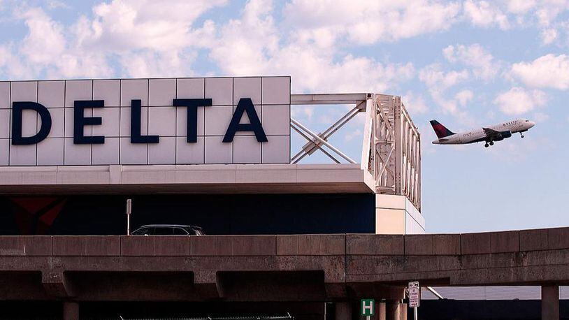 A Delta jet taking off is pictured here. Delta flights are backing up at airports around the country after a computer crash caused major delays.
