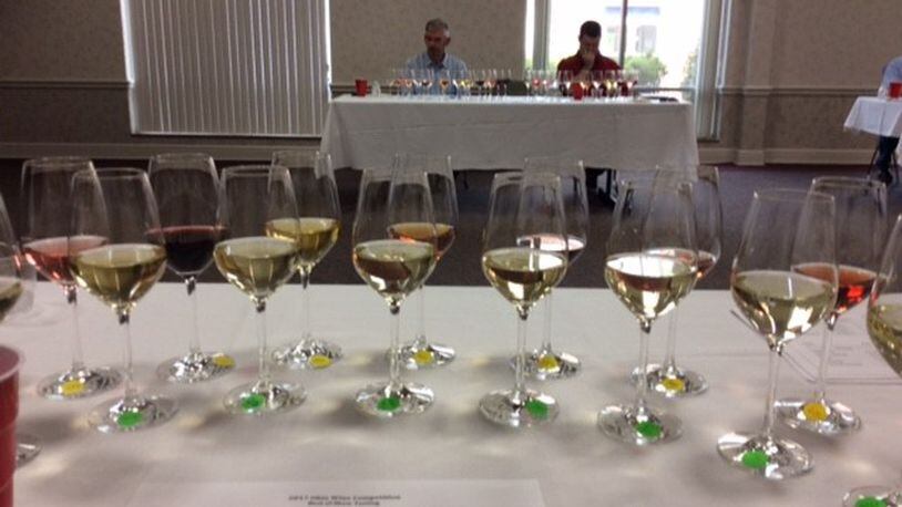 No, your wine tasting will look nothing like this lineup from a recent Ohio Wine Competition sweepstakes round. But you get the idea. MARK FISHER/STAFF
