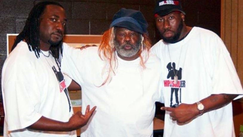 For the last 15 years DJ Skno has been a DJ and director of music programming for the CORE DJ Radio Show On Sirius XM Radio Shade45. He started DJ in 1983 and has worked at several local radio stations.  Pictured with the late Moe Beats and George Clinton.