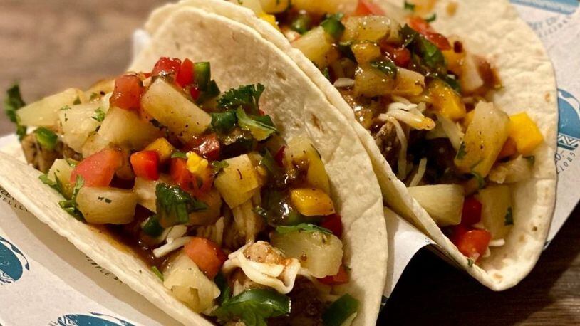 Taco Street Co. in the food court of the Mall at Fairfield Commons in Beavercreek offers menu items such as jerk chicken tacos, shrimp taco with mango salsa, taco salads, Mexican street corn, and more. CONTRIBUTED