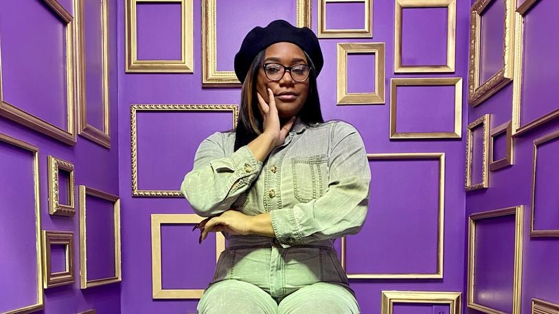 NaAsiaha Simon of Dayton, photographed in the Atlanta Selfie Museum, plans to open the Gem City Selfie Museum this summer in the Oregon District. CONTRIBUTED / NAASIAHA SIMON
