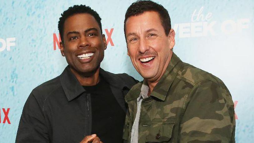 Chris Rock (left) and Adam Sandler attend the world premiere of 'The Week Of' at AMC Loews Lincoln Square 13 on April 23, 2018, in New York City.