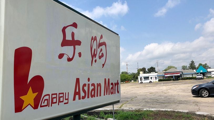 Happy Asian Mart has opened in the space once occupied by the Colony Club. MARK FISHER/STAFF