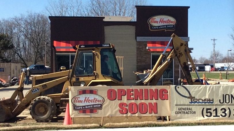 Construction crews were hard at work a month ago on this new Tim Hortons location at 1975 Harshman Road just north of Ohio 4. The location is scheduled to open Tuesday, April 18. MARK FISHER/STAFF