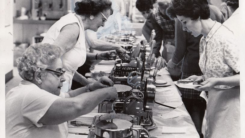 Christ Episcopal Church’s Women of the Parochial Society, one of eight women’s groups at the church at the time, launched Waffle Shop in 1929. The holiday fundraiser has grown over the years. 
Photo: Dec. 3, 1969 by Al Wilson, Journal Herald.