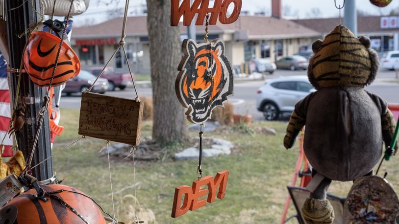 Who Dey! Dayton area Cincinnati Bengals fans cheered on their team to its first road playoff victory in franchise history with a 19-16 second round win over the Tennessee Titans on Saturday, Jan. 22, 2022. Bengals super fan Phillip “Duke” Hines was excited to watch the game at his home in Dayton’s Belmont neighborhood across from Dot’s Market which features a Bengals Man Cave on his front porch. Did we spot you watching the game at Clancy’s Tavern on Burkhardt Rd. in Riverside and Milano’s Pizza, Subs & Taps on Brown St. in Dayton close to UD campus? TOM GILLIAM / CONTRIBUTING PHOTOGRAPHER