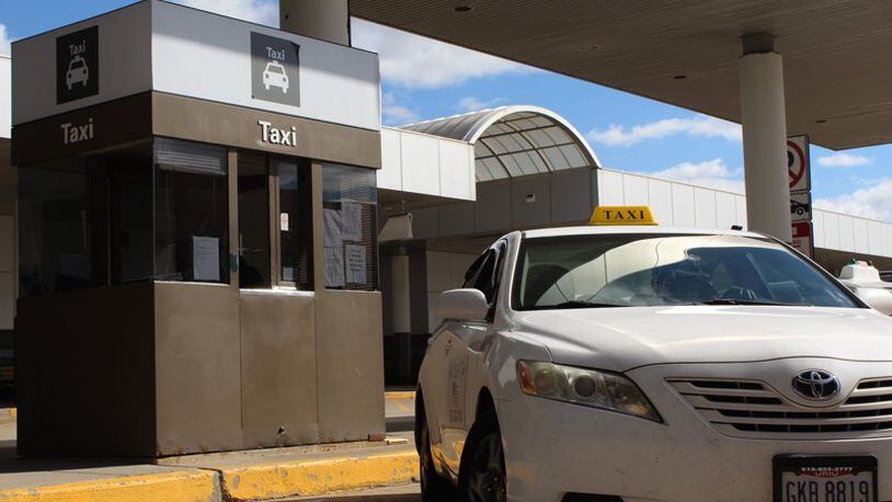 Dayton city officials could select one taxi company to handle services at the Dayton International Airport.