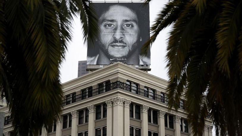 A billboard featuring former San Francisco 49ers quaterback Colin Kaepernick is displayed on the roof of the Nike Store in San Francisco.