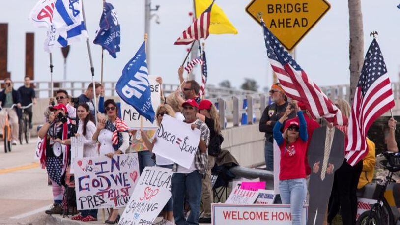 Despite President Donald Trump deciding not to travel to Palm Beach on Saturday, January 20, 2018 due to the government shutdown, supporters and protesters stood near Mar-a-Lago. (Photo: Palm Beach Post)