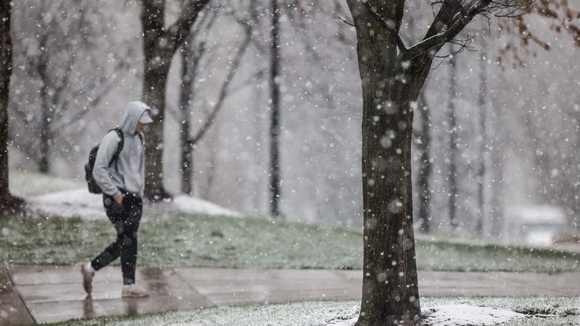 Snow falls in Dayton near the University of Dayton campus on Monday April 18, 2022. Dayton set a daily snowfall record of 2.3 inches, which broke the old record for the day of 2.2 inches set in 1953. JIM NOELKER/STAFF