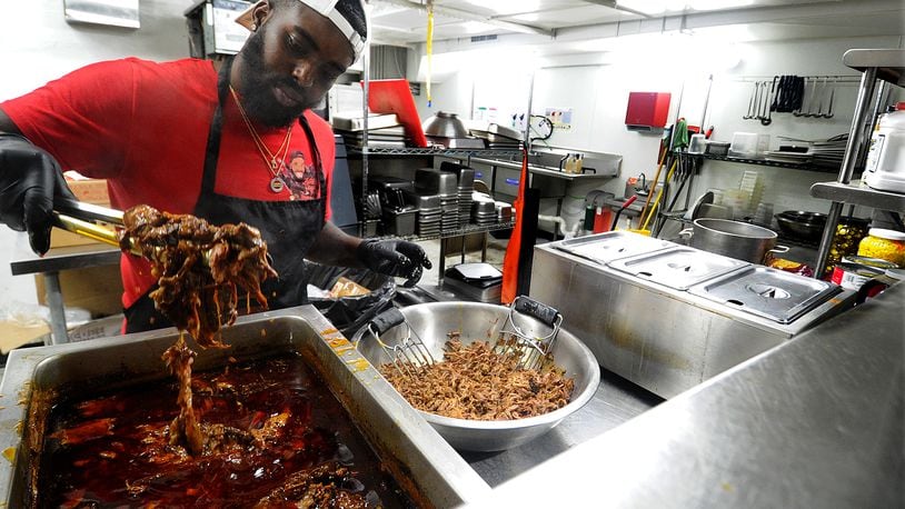 Chef Darion Lewis, prepares taco meat for taco Tuesday Sept. 20, 2022. MARSHALL GORBY\STAFF