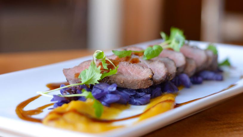 The Golden Lamb s pan roasted lamb loin with braised red cabbage, roasted acorn squash with a port reduction was one of several entrees on the historic restaurant's Bounty of the Fall Harvest menu in 2015.
