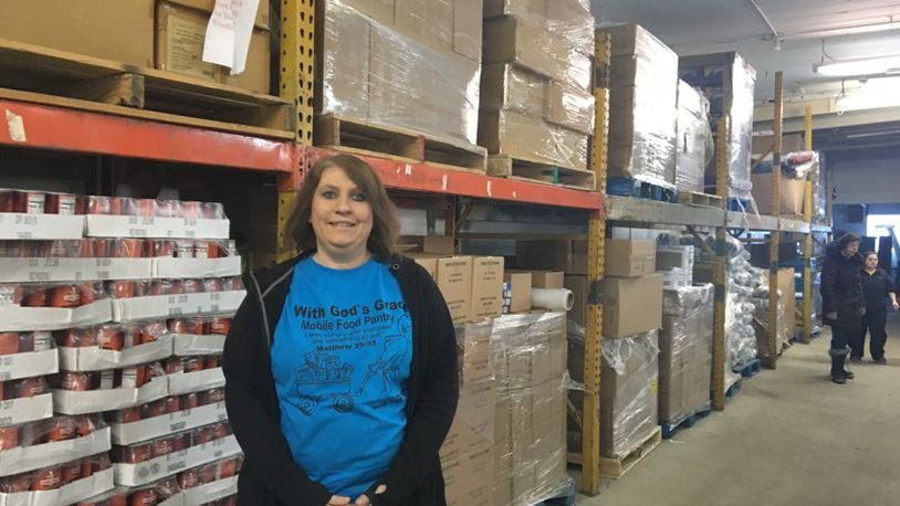 Nicole Adkins, executive director of With God’s Grace, is seeking a use variance to allow her nonprofit to operate a food pantry at 622 Springfield St.