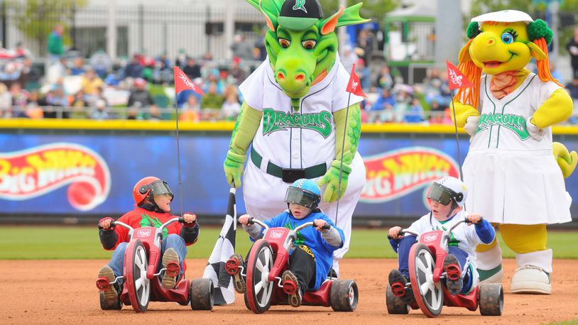 That’s how they roll: Heater and Gem with some young Dragons fans. CONTRIBUTED/FILE