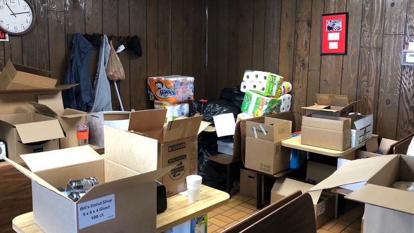 The side room at Bill's  Donuts in Centerville is starting to fill up with donated items to be taken to Florida for hurricane relief. MARK FISHER/STAFF