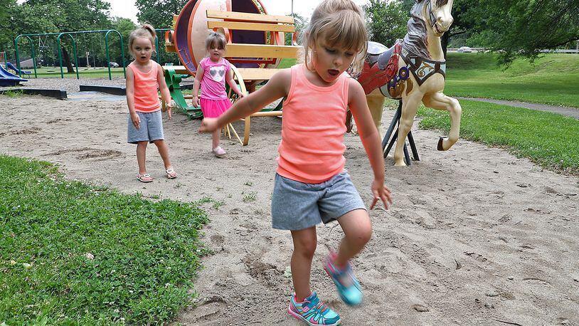 Claire Salser says “She was right here yesterday.” When she and her sisters, Layla and Cleora were asked about the Cinderella statue that was stollen from the Veteran’s Park playground Thusday. Bill Lackey/Staff