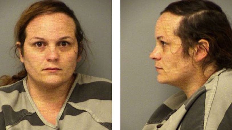 Magen Fieramusca, 33, of Houston, is seen in a Dec. 20, 2019, mugshot taken following her arrest on charges of kidnapping and tampering with a corpse. Fieramusca is accused of abducting her friend, Heidi Broussard, 33, and Broussard's newborn daughter, Margot Carey, from their Austin, Texas, apartment complex Dec. 12, 2019. Broussard was found dead in the trunk of Fieramusca's car Dec. 19, but Margot was found unharmed.