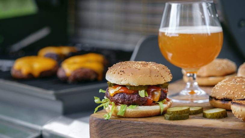Burger and beer are the perfect pairing for Fourth of July cookouts. CONTRIBUTED