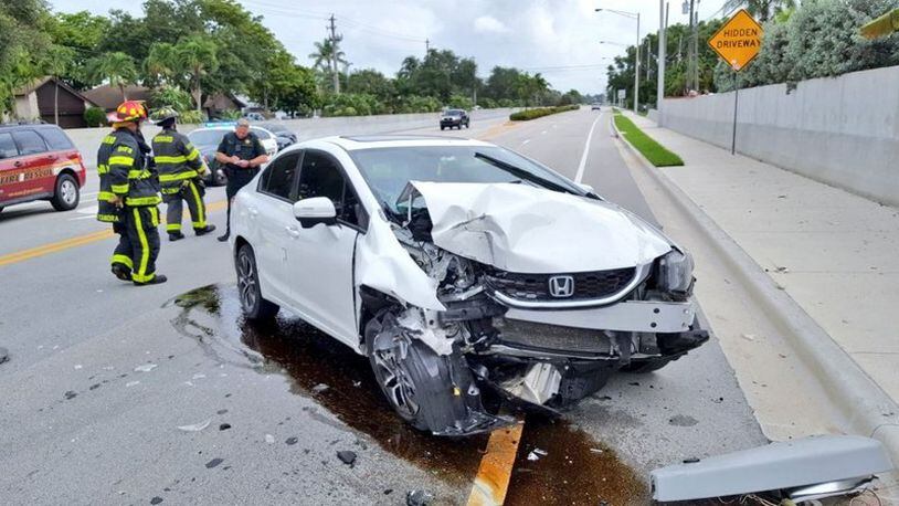 A car crashed into a light pole in Cooper City, Fla. on Tuesday, June 13, 2017. Deputies were told the crash happened when a driver saw a spider loose in the car. (Broward Sheriff's Office)