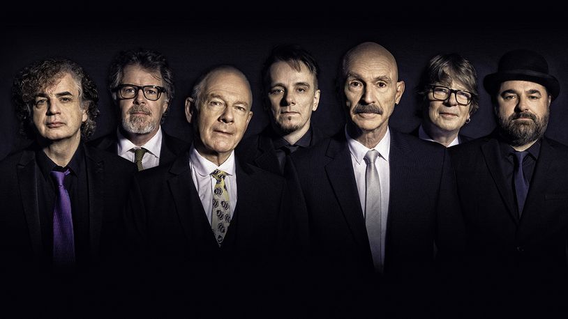 The three-drummer lineup of the ever-evolving progressive rock act King Crimson, (left to right) Jakko Jakszyk, Pat Mastelotto, Robert Fripp, Gavin Harrison, Tony Levin, Mel Collins and Jeremy Stacey, performs at Rose Music Center in Huber Heights on Thursday, Sept. 2. CONTRIBUTED